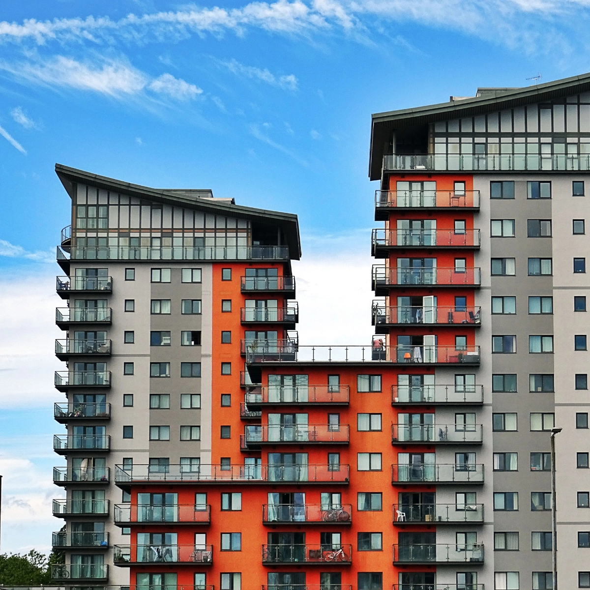Orange and gray buildings on a clear sunny day